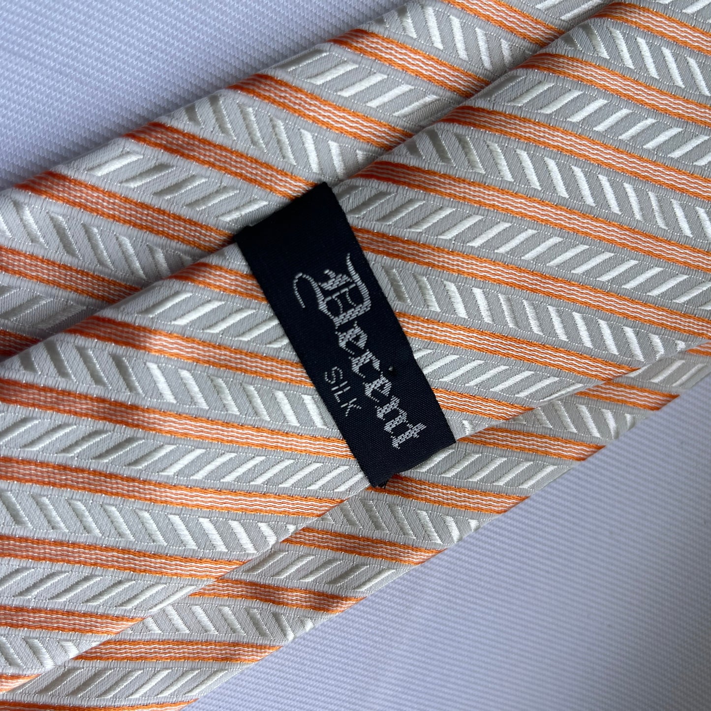 Decent Orange and Silver Striped Necktie